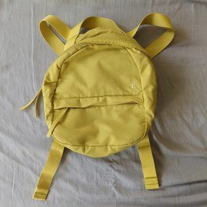 everlane mini backpack in mustard